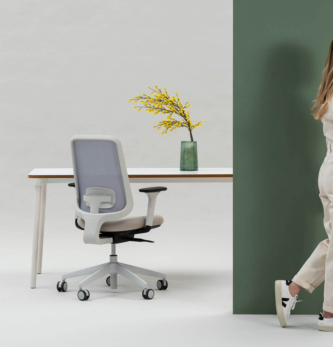Person Walking Away From A Desk And Task One Grey Frame Office Chair With Arms And Cedar Seat