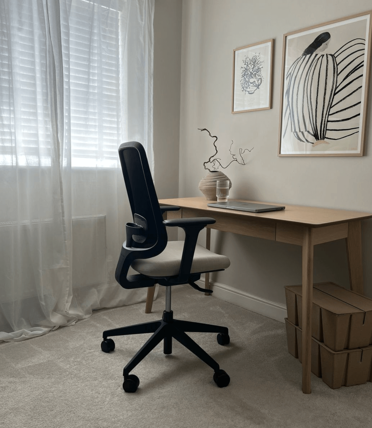 Task One Black Frame Office Chair With Arms and Cedar Seat in a Home Setting