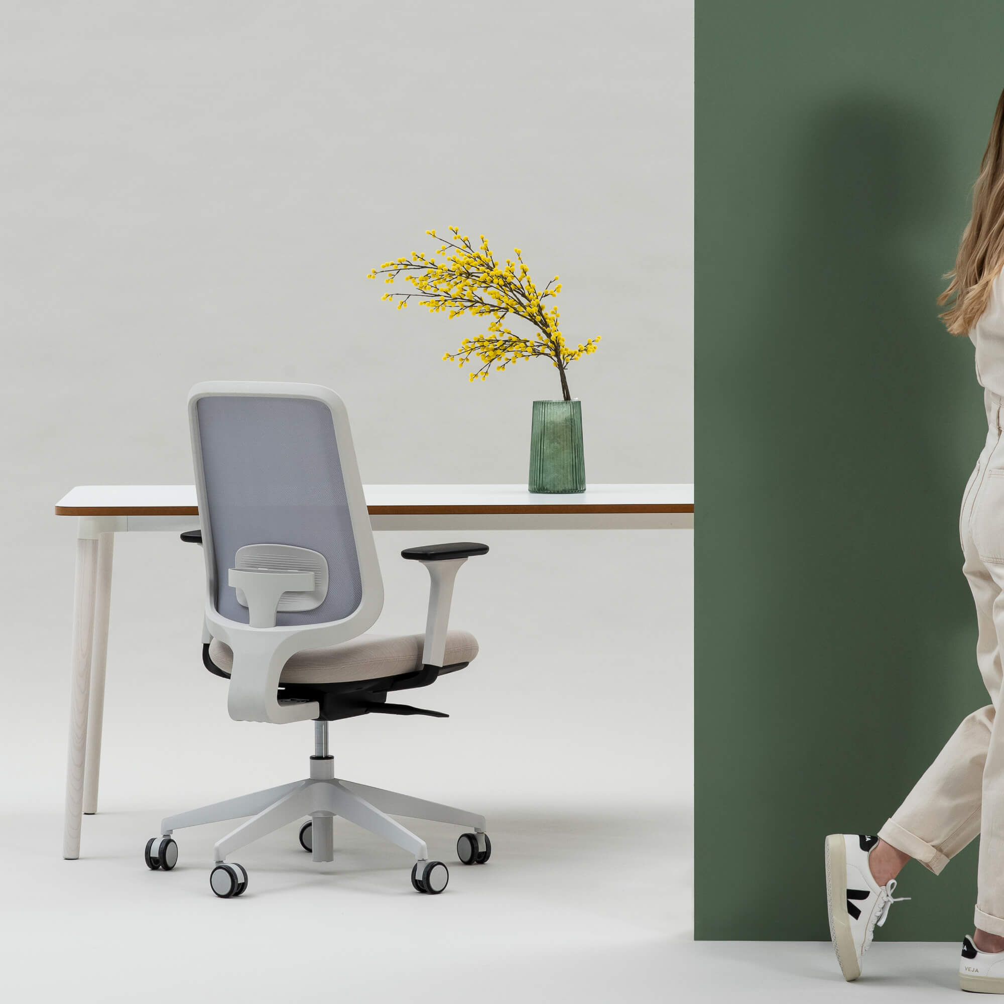 Person Walking Away From Their Desk And A Task One Grey Frame Office Chair With Arms