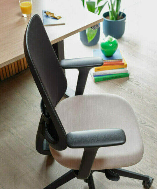 Side View of a Task One Black Frame Office Chair With Arms