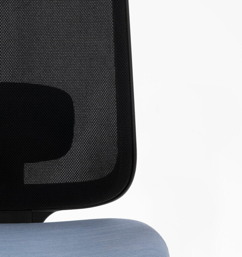 A Close-Up Of The Mesh Back Support On A Task One Black Frame Office Chair With No Arms